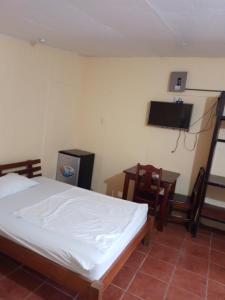 Μια τηλεόραση ή/και κέντρο ψυχαγωγίας στο Backpackers Corcovado Tours