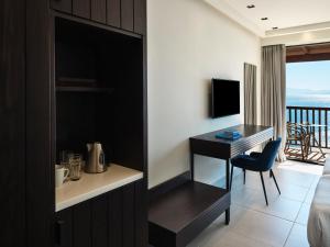 A television and/or entertainment centre at Aeolos Beach Resort