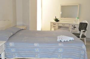 Letto o letti in una camera di Hotel Metropolitan I