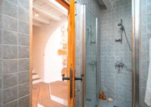 a shower with a glass door in a bathroom at Villa Marea - Old Town Retreat in Hvar +61 photos