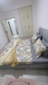 Postel nebo postele na pokoji v ubytování Spacieux Appartement a 2pas a la plage