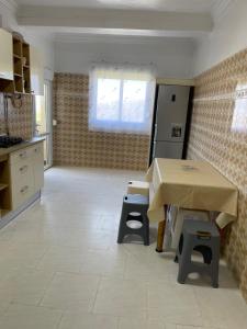 Kuchyň nebo kuchyňský kout v ubytování Spacieux Appartement a 2pas a la plage