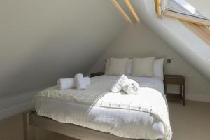 Ένα ή περισσότερα κρεβάτια σε δωμάτιο στο Bell House Oxford - The Chalet