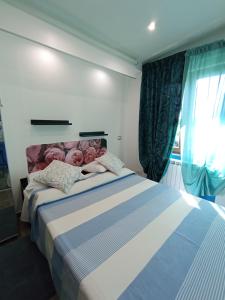 Ένα ή περισσότερα κρεβάτια σε δωμάτιο στο Casa Mia