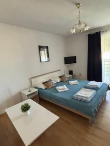 Postel nebo postele na pokoji v ubytování Apartmani Ira