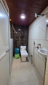 Ένα μπάνιο στο Pallav Guest House