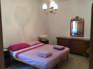 Posteľ alebo postele v izbe v ubytovaní Otranto in riva al mare
