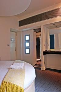 Postel nebo postele na pokoji v ubytování Semeli Hotel