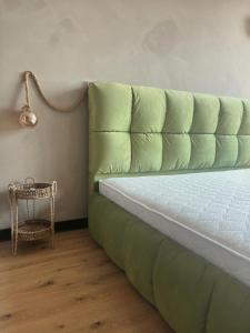 Ένα ή περισσότερα κρεβάτια σε δωμάτιο στο Central Apartment