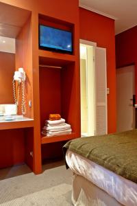 Postel nebo postele na pokoji v ubytování Semeli Hotel