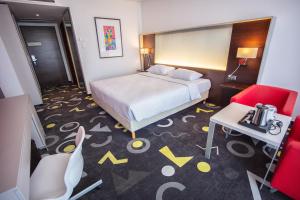 Posteľ alebo postele v izbe v ubytovaní Park Inn by Radisson Sarvar Resort & Spa - All Inclusive