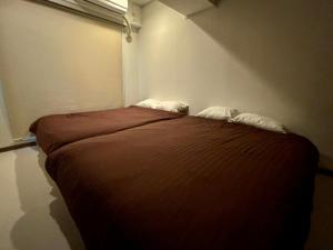 MolinHotels201温泉付き別荘 -アクティビティを満喫できる札幌定山渓-2LDK W-beds2&S-beds4客房内的一张或多张床位