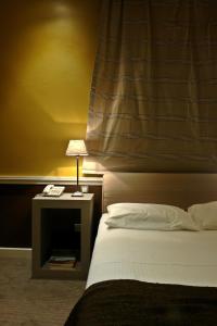 Postel nebo postele na pokoji v ubytování Semeli Hotel