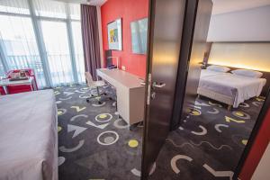 Posteľ alebo postele v izbe v ubytovaní Park Inn by Radisson Sarvar Resort & Spa - All Inclusive