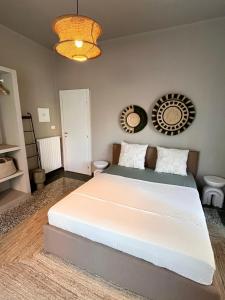 Postel nebo postele na pokoji v ubytování Bella Italia Holiday Home - The Heart of Santa Margherita