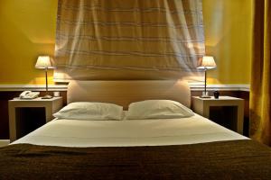 Postel nebo postele na pokoji v ubytování Semeli Hotel