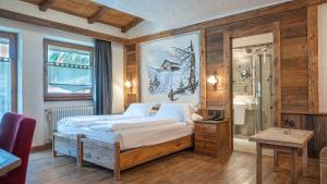 Postel nebo postele na pokoji v ubytování Hotel Crosal