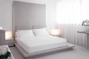 Postel nebo postele na pokoji v ubytování B&B HOTEL Padova Methis
