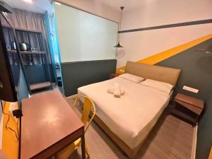 Postel nebo postele na pokoji v ubytování Smile Hotel Subang Airport