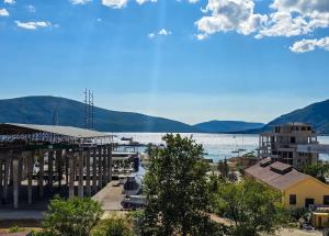 a view of a city and a body of water at Boka Place Home Thea in Tivat