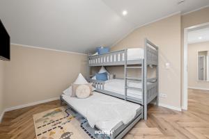 Ένα ή περισσότερα κρεβάτια σε δωμάτιο στο Penthouse Wohnung Seeluft-Lounge