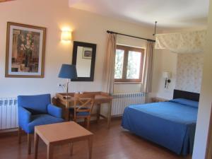 Postel nebo postele na pokoji v ubytování Hotel Galayos