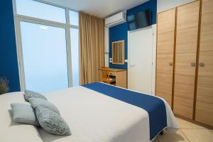 Postel nebo postele na pokoji v ubytování Hotel Aldebaran