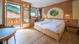 Postel nebo postele na pokoji v ubytování Hotel Crosal