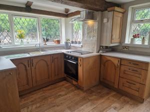 Köök või kööginurk majutusasutuses The Stables Cottage at Glyn Isa