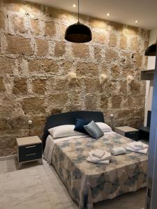 Postel nebo postele na pokoji v ubytování Lapis rooms