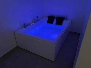Postel nebo postele na pokoji v ubytování Lapis rooms