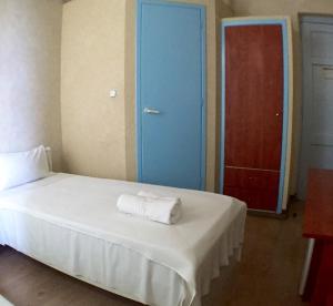 Posteľ alebo postele v izbe v ubytovaní Orfeas Hotel