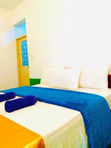 Postel nebo postele na pokoji v ubytování Marina Way Hotel