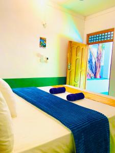 Postel nebo postele na pokoji v ubytování Marina Way Hotel