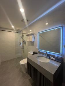 Koupelna v ubytování ILOILO GRAND HOTEL