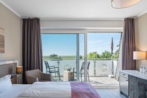 Postel nebo postele na pokoji v ubytování Hotel Strand No.1