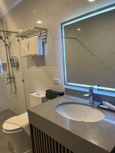 Koupelna v ubytování ILOILO GRAND HOTEL
