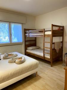 Ένα ή περισσότερα κρεβάτια σε δωμάτιο στο Casa vacanza Veronica con giardino