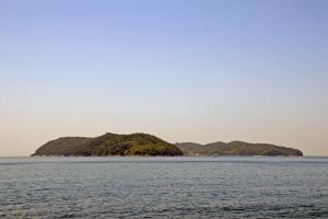 an island in the middle of a body of water at La maison du sud d'awaji - Ocean View Private Villa in Minamiawaji