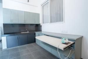 Kuchyň nebo kuchyňský kout v ubytování Raj Residencies + 37 fotografií