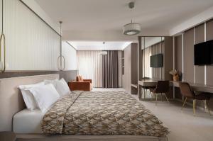 Postelja oz. postelje v sobi nastanitve Core Hotel