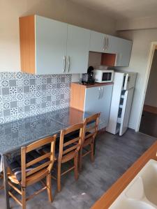 Η κουζίνα ή μικρή κουζίνα στο Appartement t3 privatif 56m2 La Baule proche mer