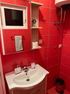 Koupelna v ubytování Komforan studio u centru grada + 13 fotografií