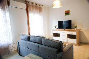Televisyen dan/atau pusat hiburan di Encantador piso en el corazón del Albayzín