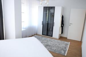 En eller flere senger på et rom på La Vue