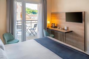 Postel nebo postele na pokoji v ubytování Best Western Hotel Fontaine Argent