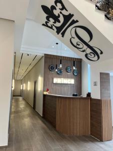 a lobby of aarmaarmaarma restaurant with a sign on the wall at Prince Hotel Kapan in Kapan +30 photos