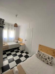 Ένα ή περισσότερα κρεβάτια σε δωμάτιο στο CASA RETINTO