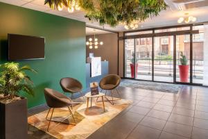 TV a/nebo společenská místnost v ubytování Best Western Hotel Fontaine Argent