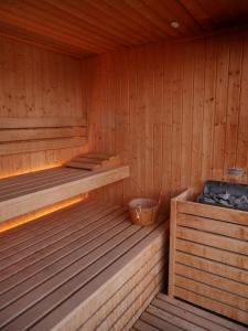 a wooden sauna with two beds in it at Hotel Paradiso Como in Brunate +80 photos